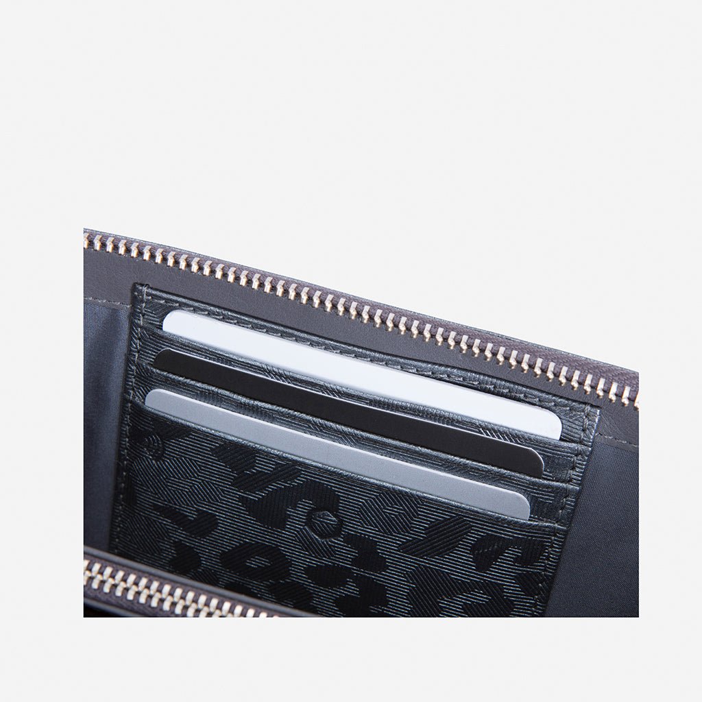 Jekyll and Hide medium zip around purse in shimmer leather, featuring card slots and a compact design, inside image with cards