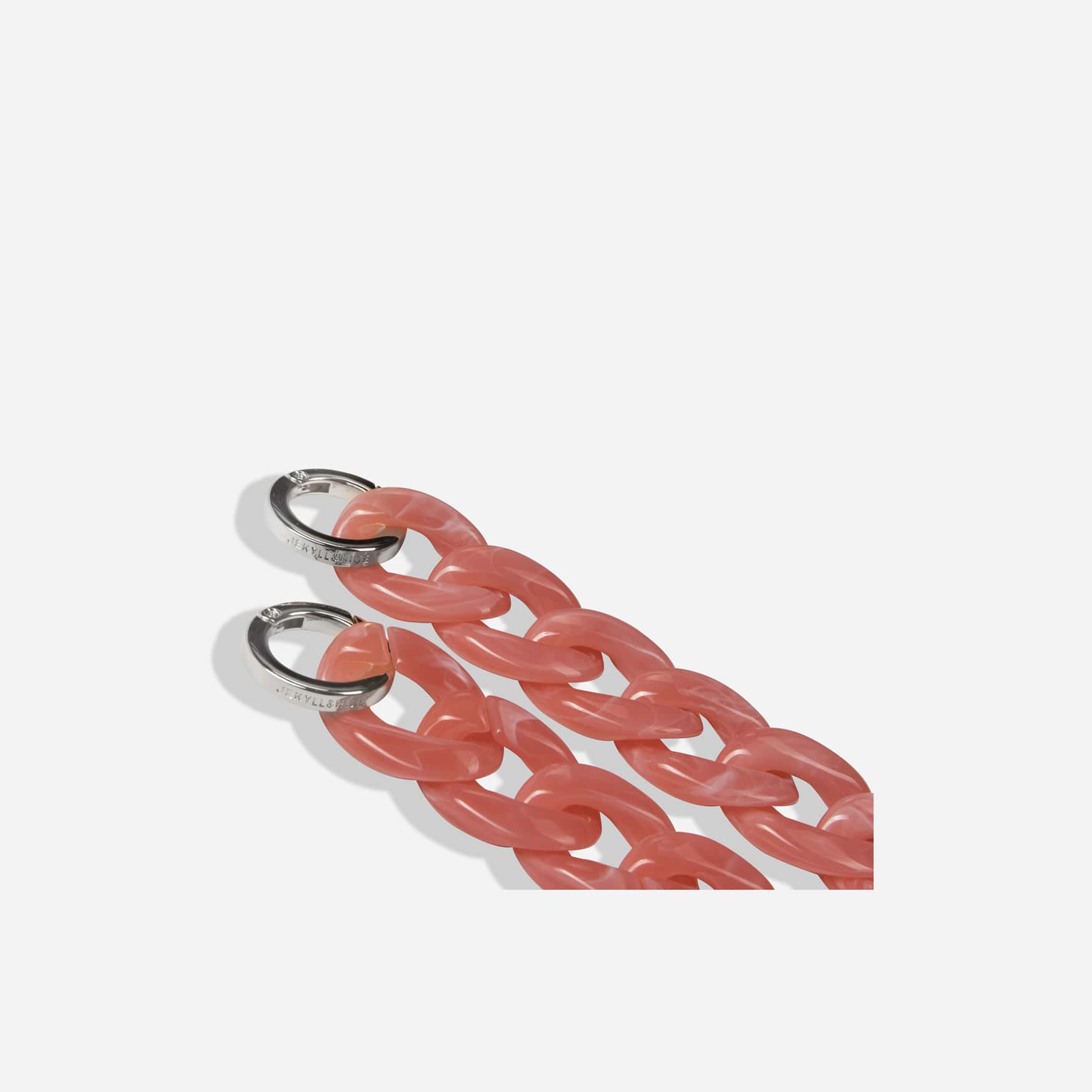 Jekyll and Hide stylish chain strap in pink, designed to complement handbags with a sleek and elegant finish, closeup image