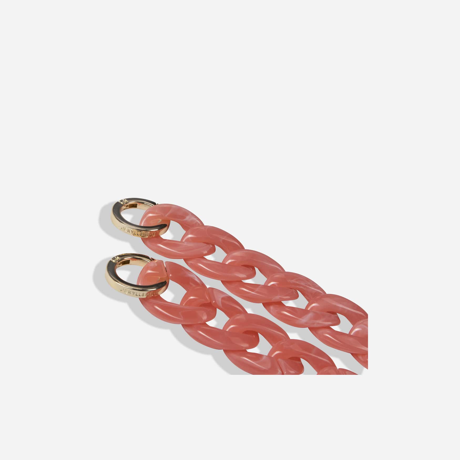 Jekyll and Hide stylish chain strap in pink, designed to complement handbags with a sleek and elegant finish, closeup image