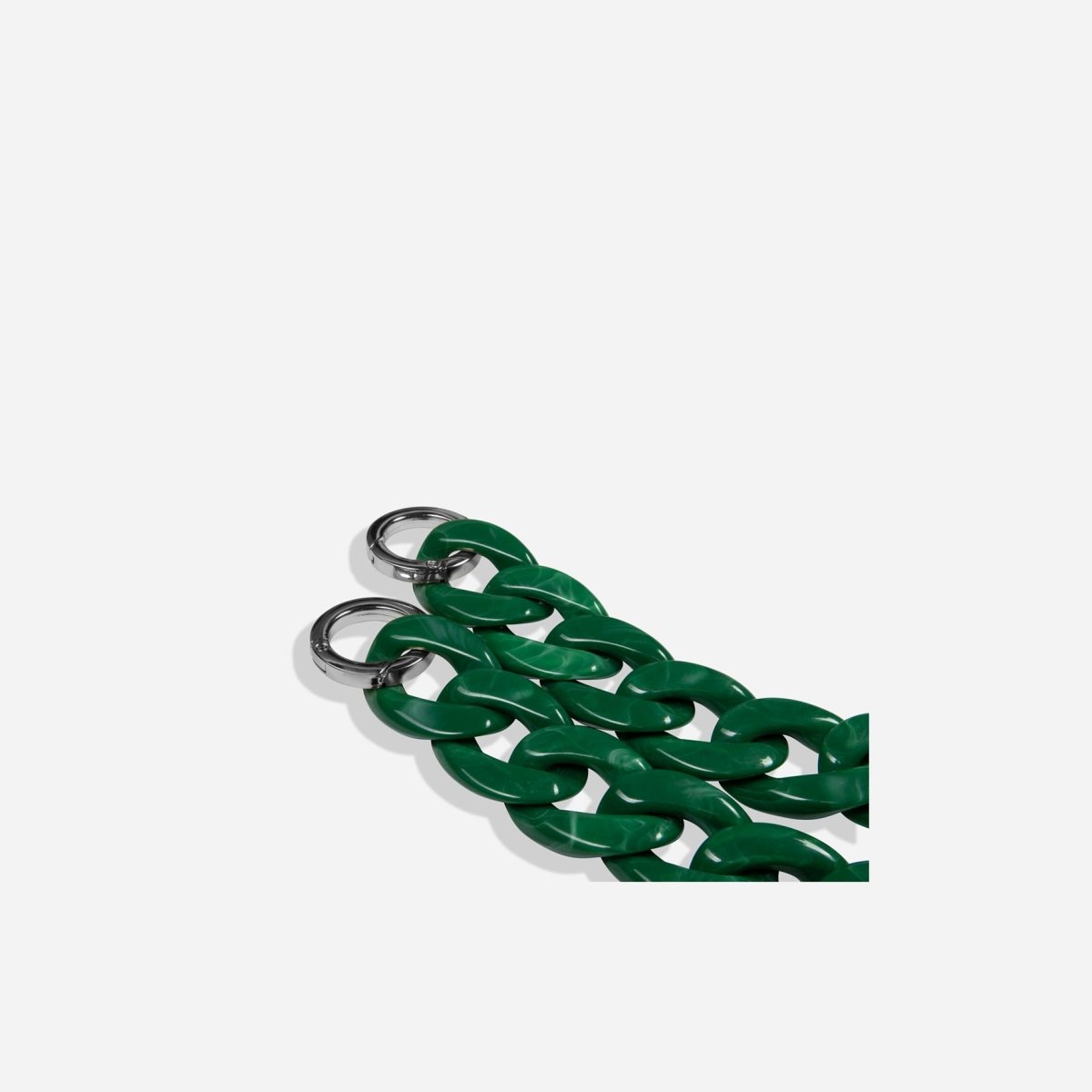 Jekyll and Hide stylish chain strap in green, designed to complement handbags with a sleek and elegant finish, closeup image