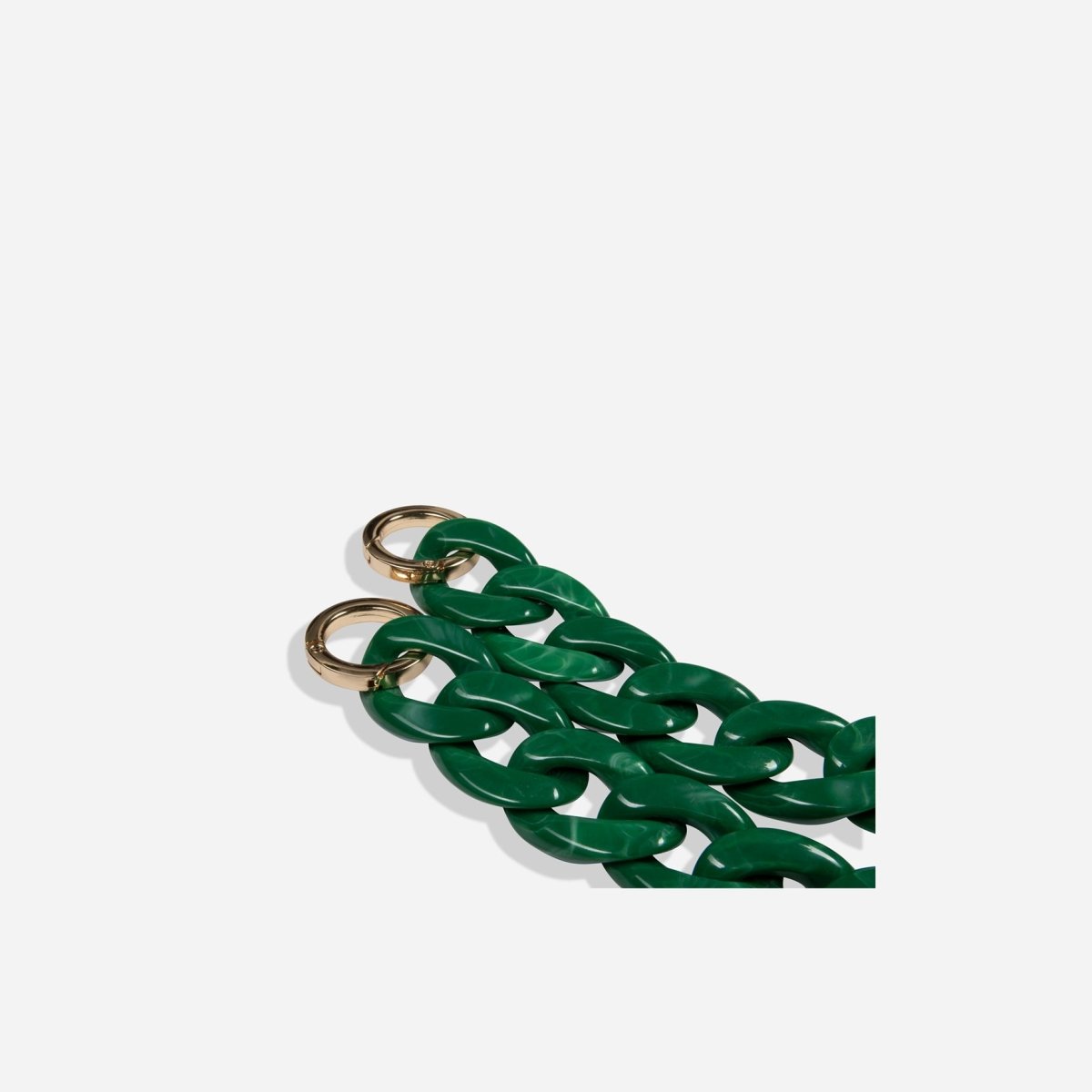 Jekyll and Hide stylish chain strap in green, designed to complement handbags with a sleek and elegant finish, closeup image