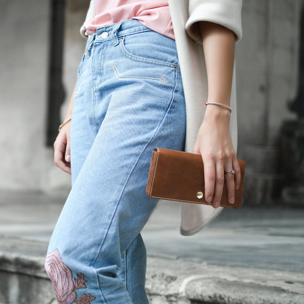 Jekyll and Hide large red leather purse with multiple compartments, offering space for cards, cash, coins, lifestyle image