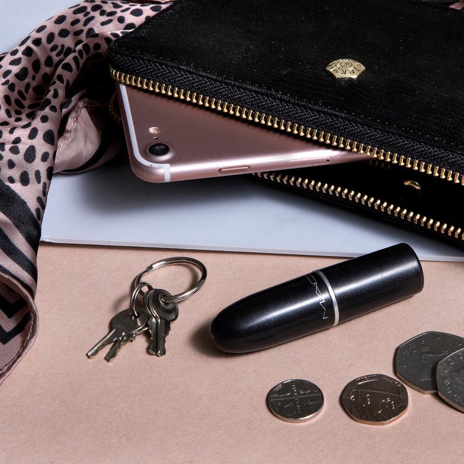 Jekyll and Hide medium zip around purse in black leather, with multiple card slots and a secure zip closure, lifestyle image