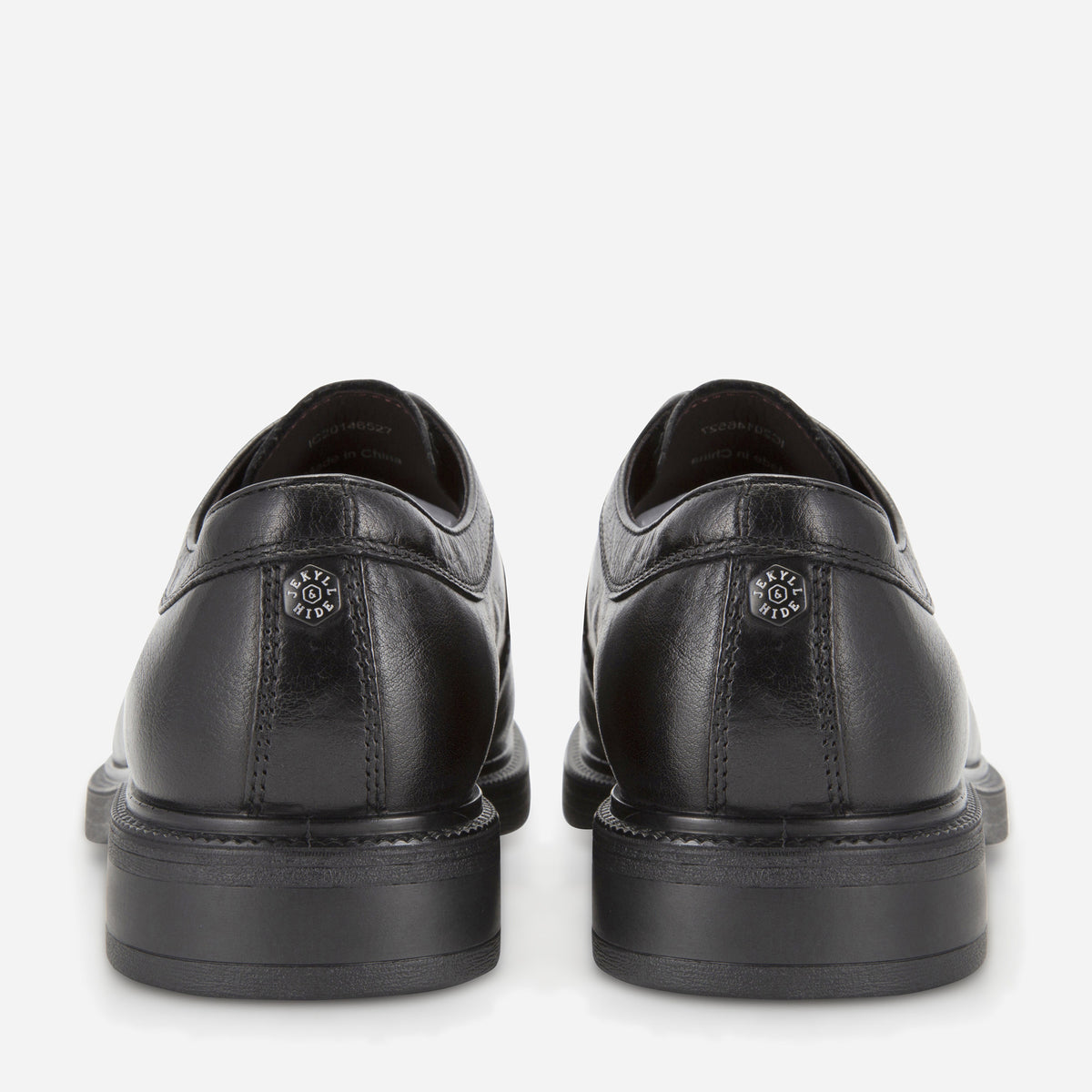Heels of the black Oxford Derby Shoes with embossed logo