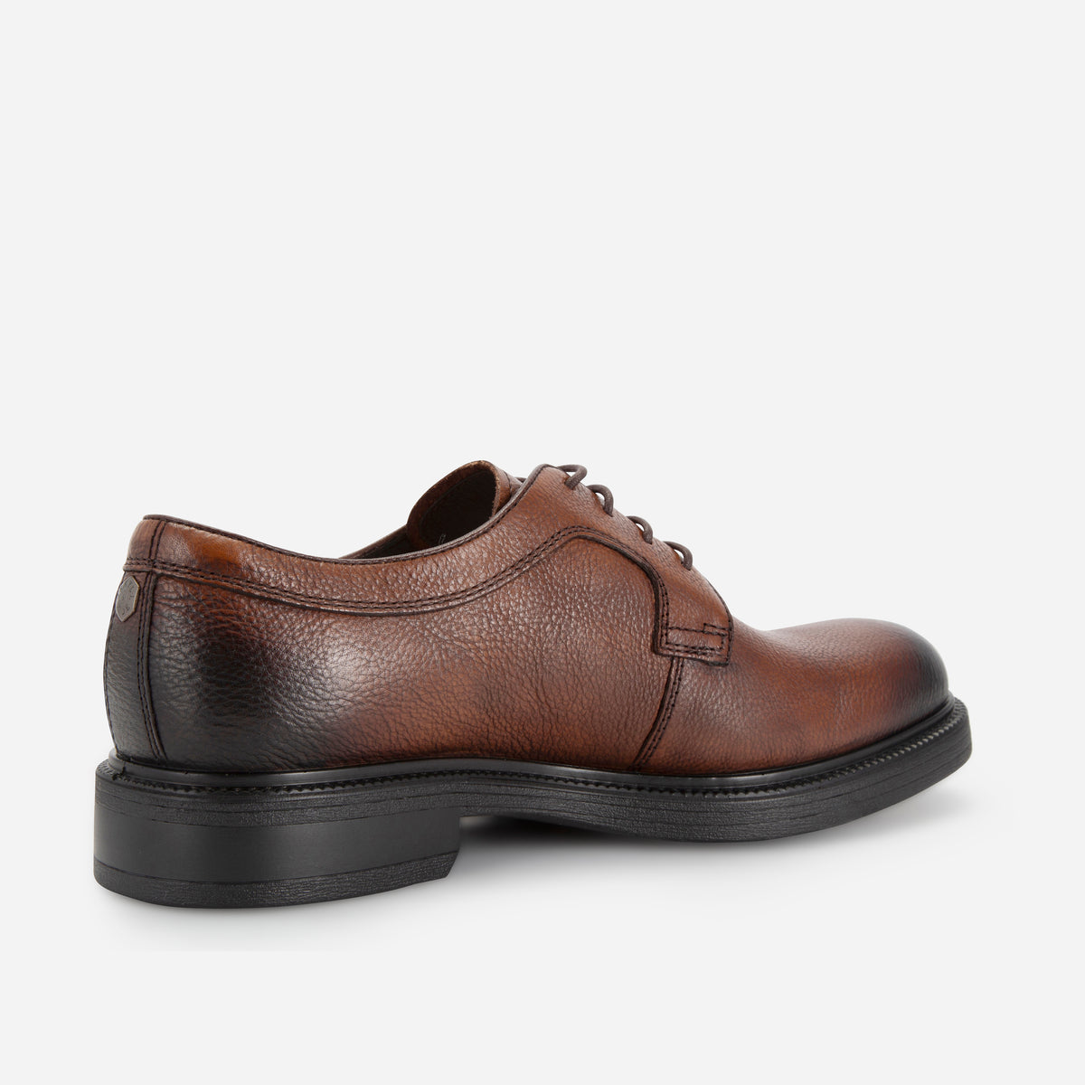 Rear three-quarter view of the brown leather Oxford Derby Shoe