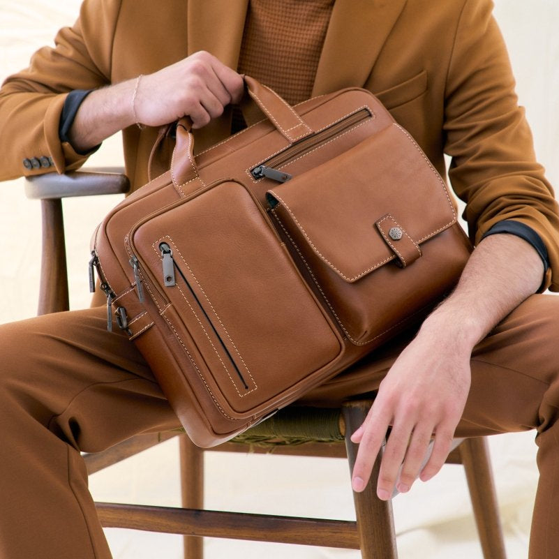 Tan leather laptop briefcase, lifestyle image – Jekyll & Hide