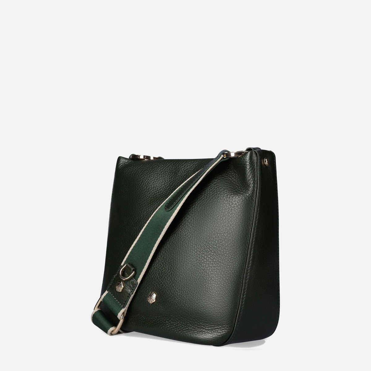 Three-quarter view of the Militar green leather Crossbody Bag with its strap