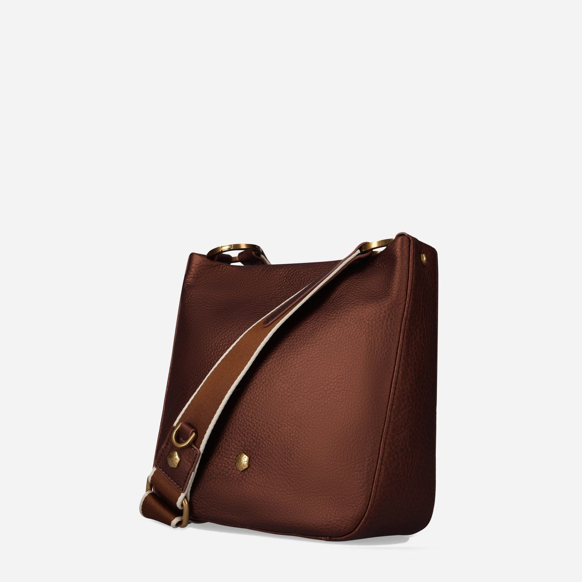 Three-quarter view of the Majestic brown leather Crossbody Bag with its strap