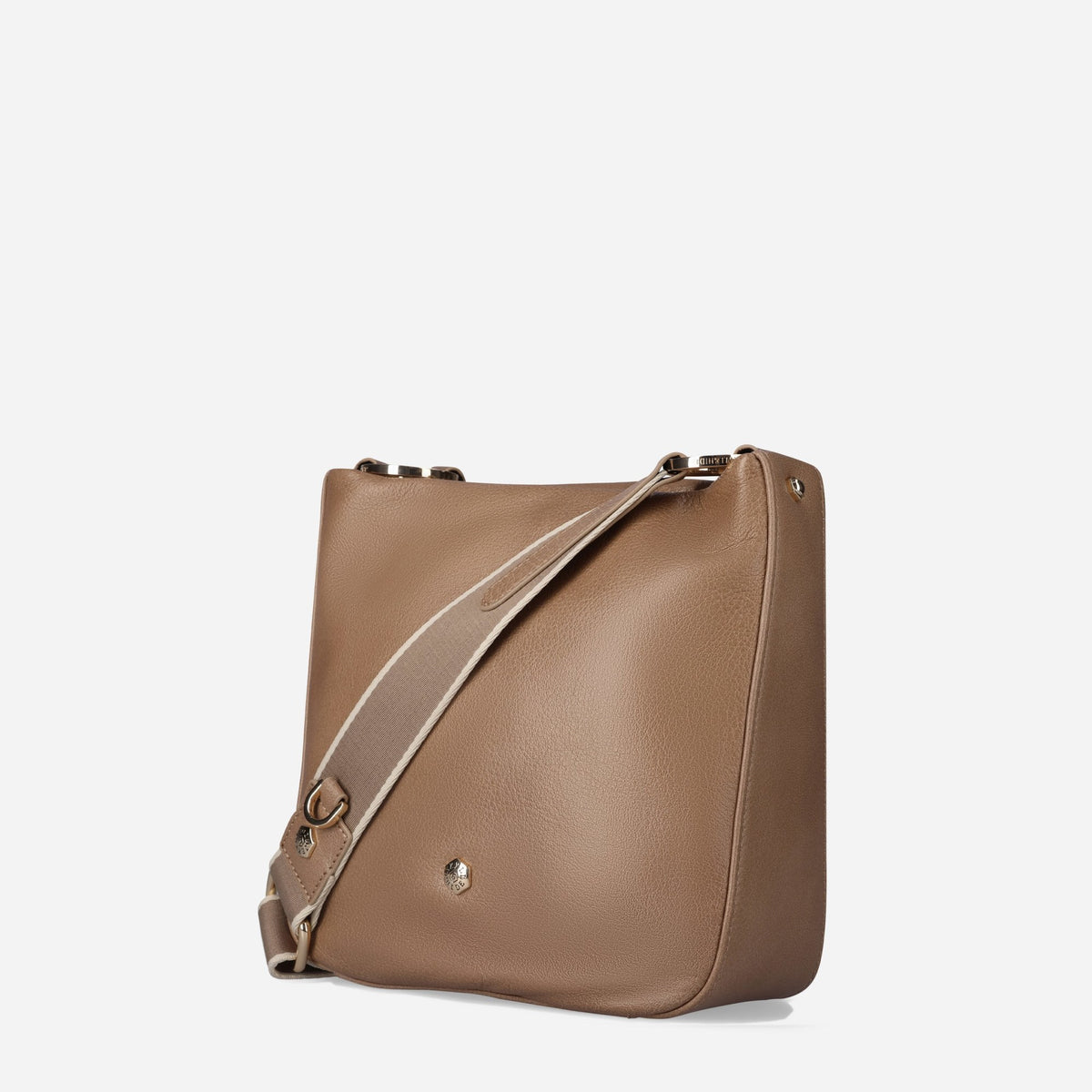 Three-quarter view of the Oyster taupe leather Crossbody Bag with its strap