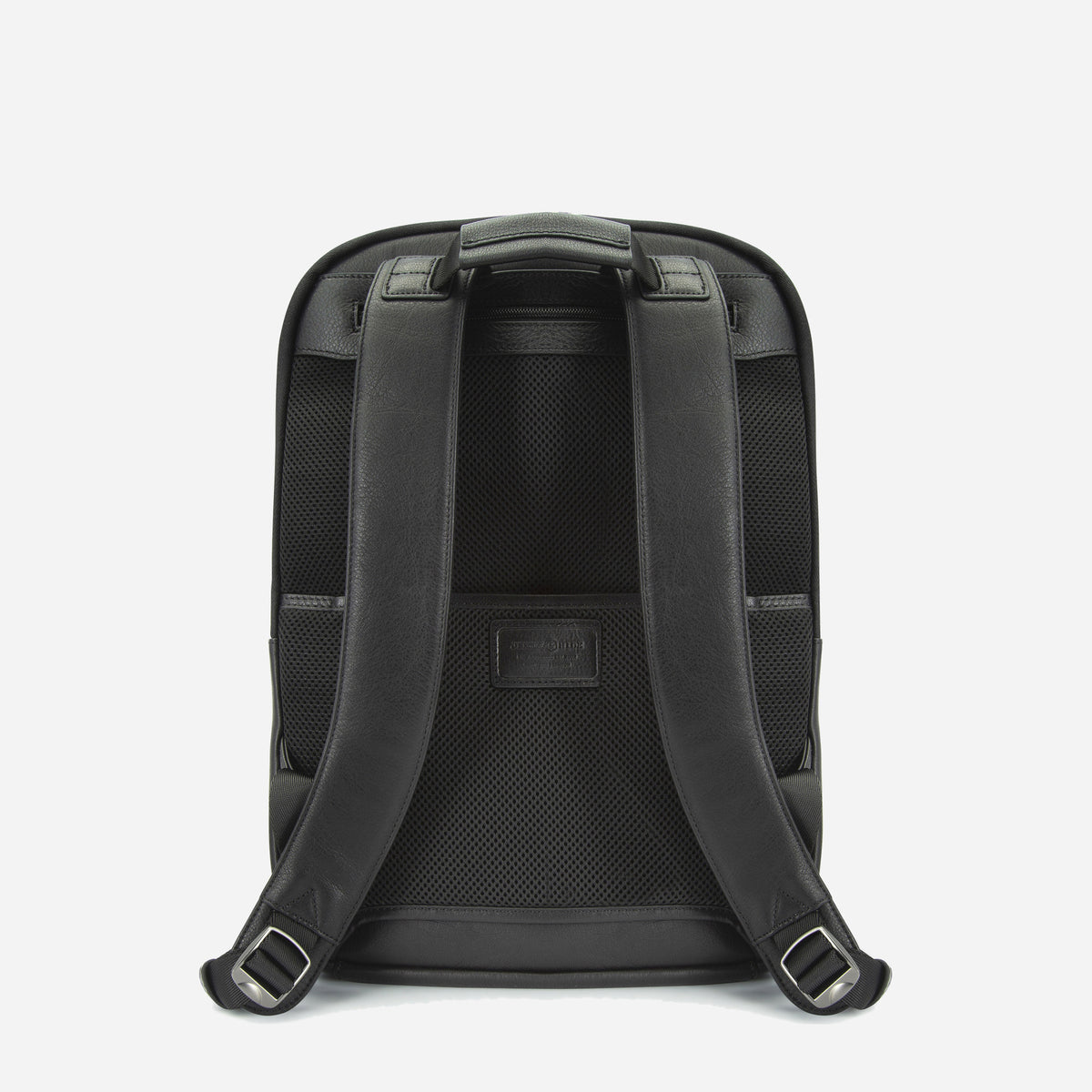 Back of the black Cargo Backpack with padded mesh panel and shoulder straps