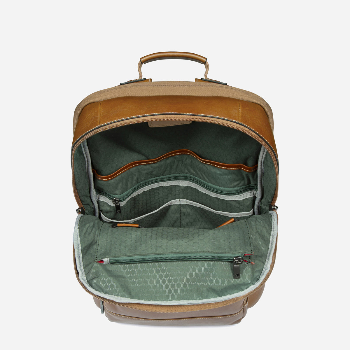 Colt Cargo Backpack unzipped, showing the sage green lining and organiser pockets