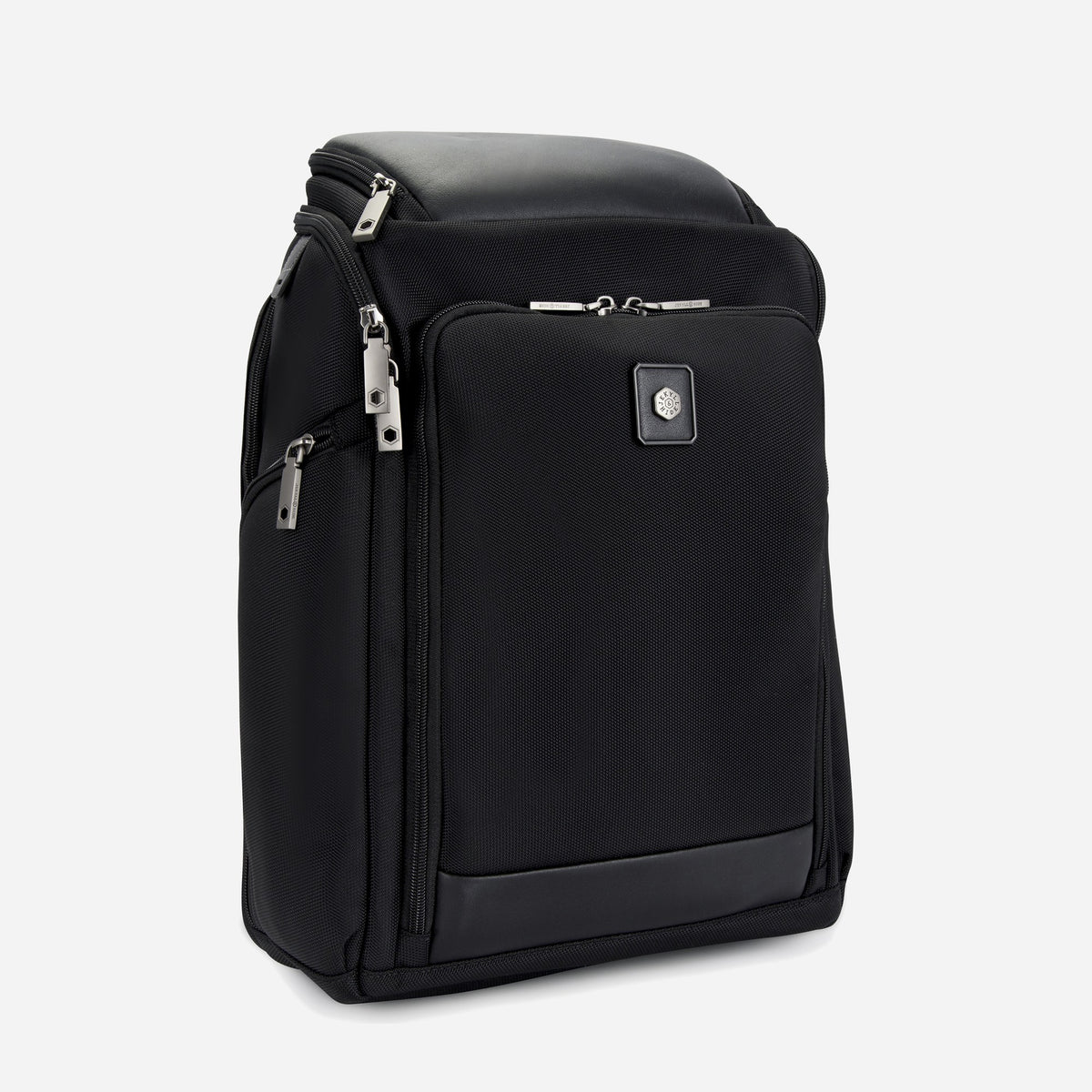 Three-quarter view of the black nylon Tokyo Flip-Top Backpack