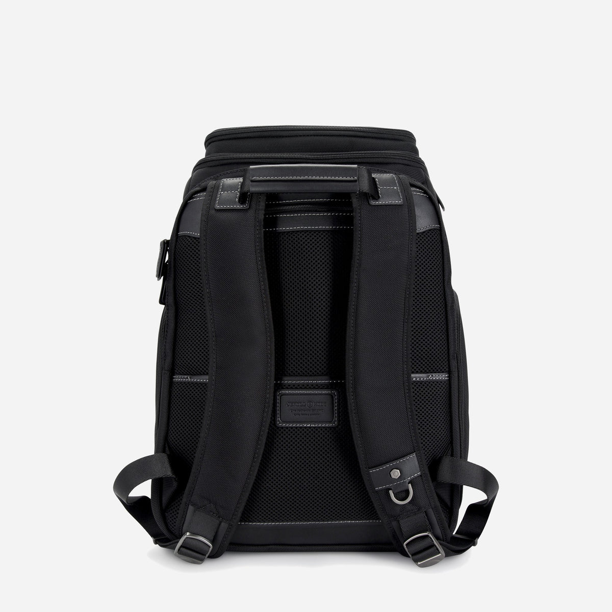 Back of the Tokyo Flip-Top Backpack with padded straps and brand patch