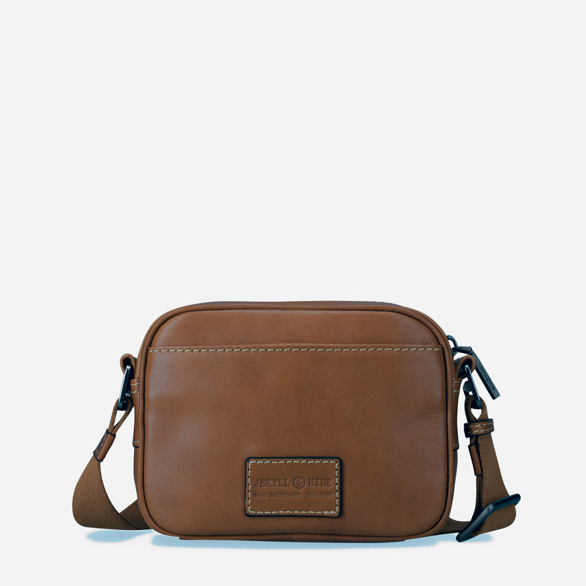 Back of the Colt tan leather Crossbody Bag with brand plaque
