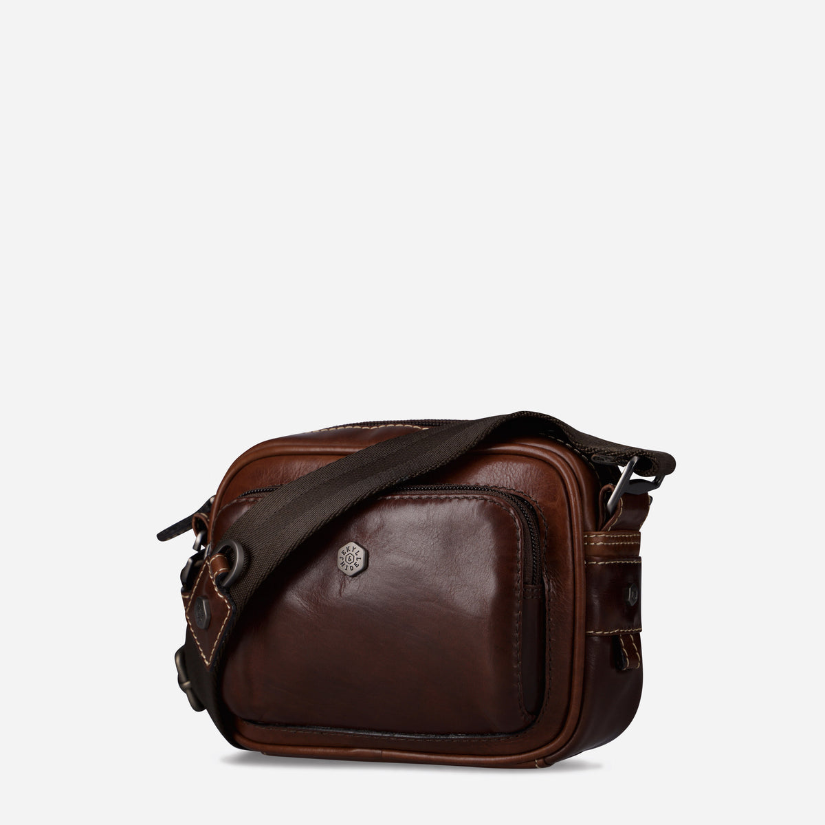 Three-quarter view of the Mocha leather Crossbody Bag with its webbing strap