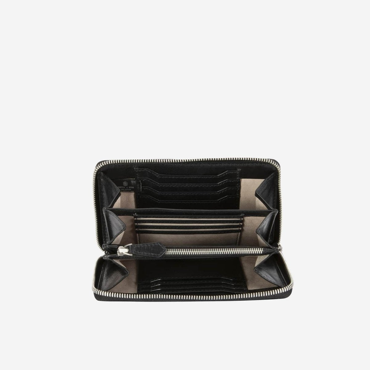 Jekyll and Hide medium zip around purse in mocha, with card slots and a secure zip closure, inside image with props