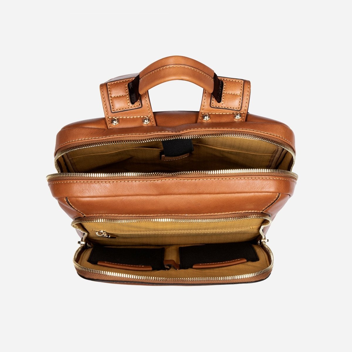 Tan leather laptop backpack open, showing the padded laptop compartment – Jekyll & Hide