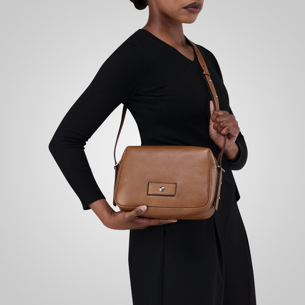 Tan leather crossbody bag worn across the body – Jekyll & Hide