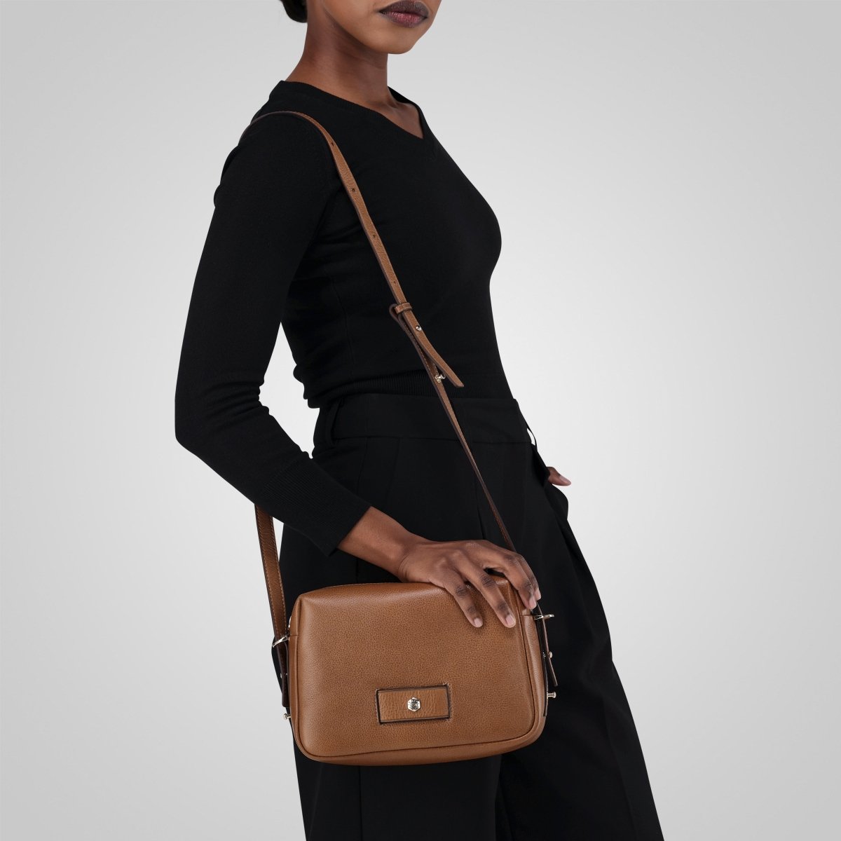 Tan leather crossbody bag worn on the shoulder – Jekyll & Hide