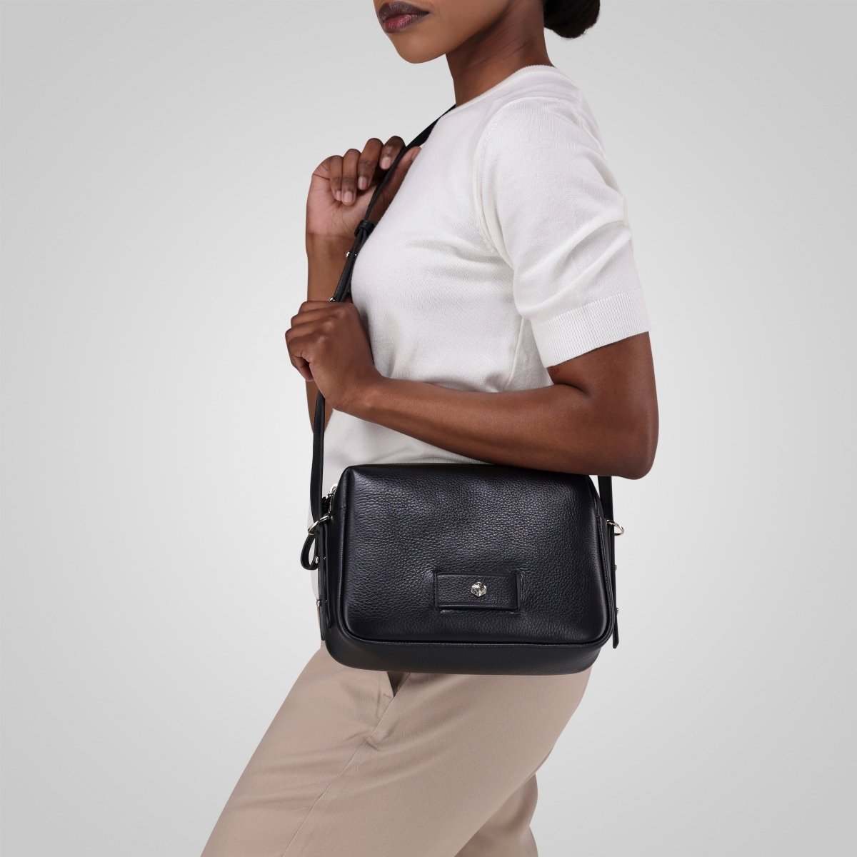 Black leather crossbody bag worn across the body – Jekyll & Hide