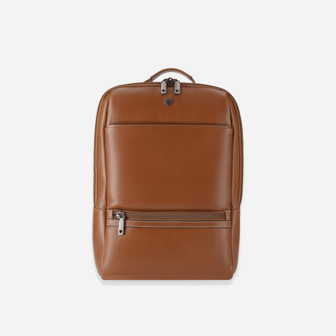 Jekyll and Hide 17-inch leather backpack in classic tan with padded laptop compartment and adjustable straps, front image