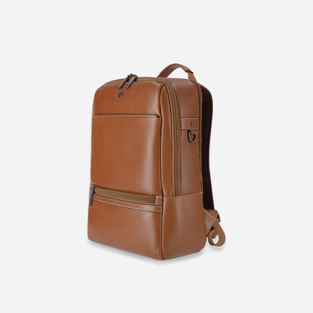 Jekyll and Hide 17-inch leather backpack in classic tan with padded laptop compartment and adjustable straps, side image