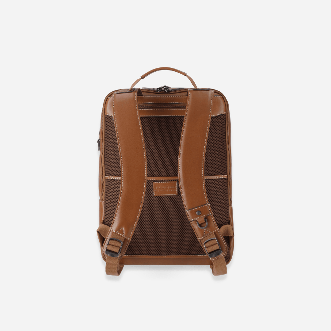 Jekyll and Hide 17-inch leather backpack in classic tan with padded laptop compartment and adjustable straps, back image