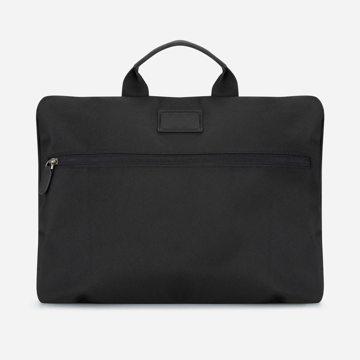 Back of the black shirt and laundry bag, showing the zip pocket and leather label, Jekyll & Hide