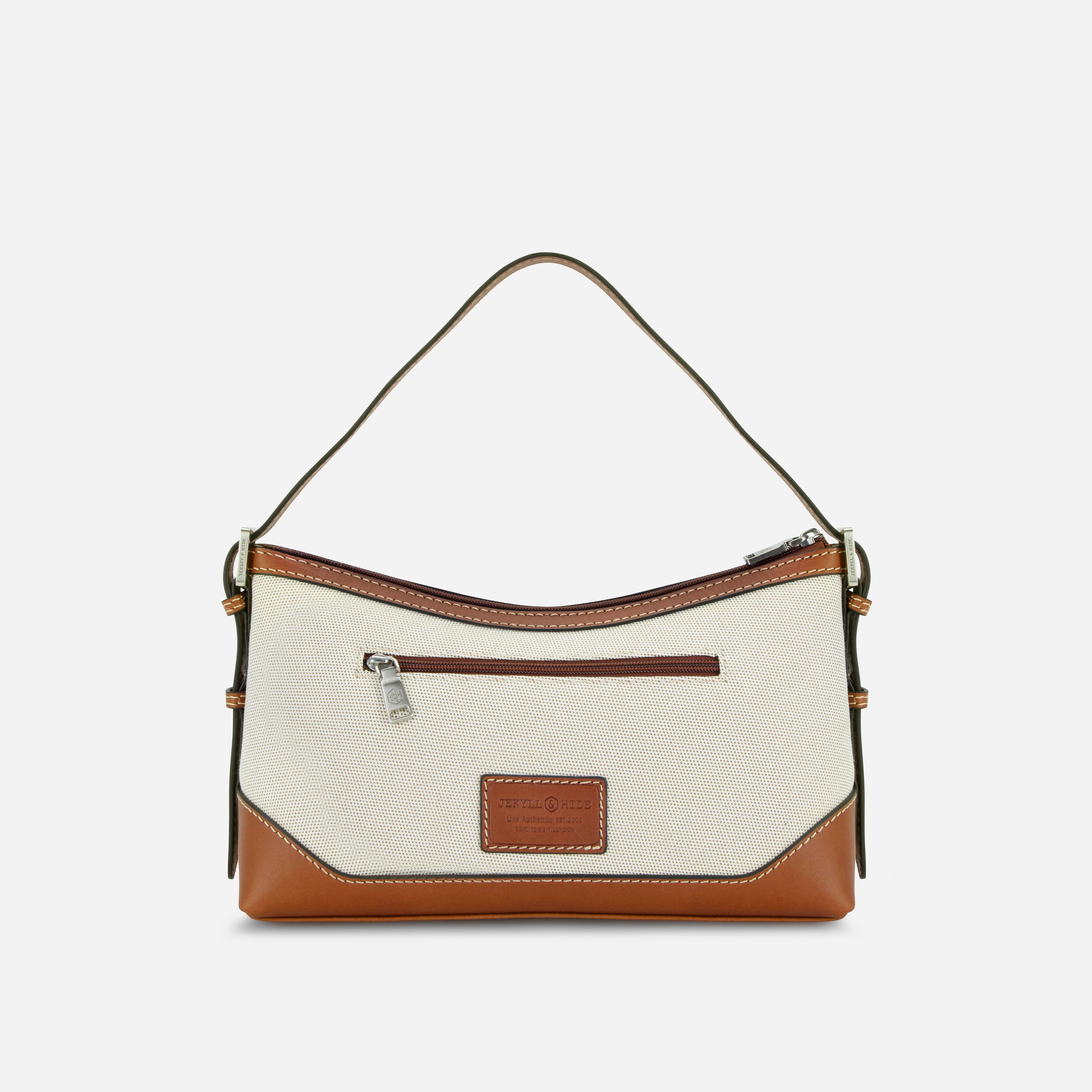 Jekyll & Hide Canvas Sling Handbag in Colt, back view with full-width zip pocket