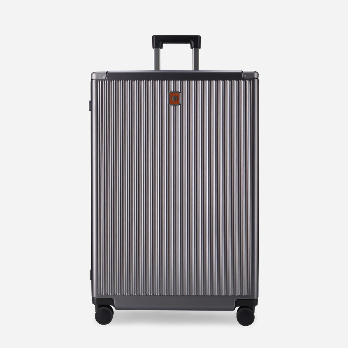 Front of the Colt Large Check-In suitcase with brand badge and trolley handle