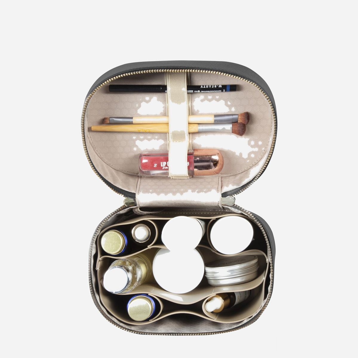 Black Geneva Vanity Case open from above, filled with make-up and brushes