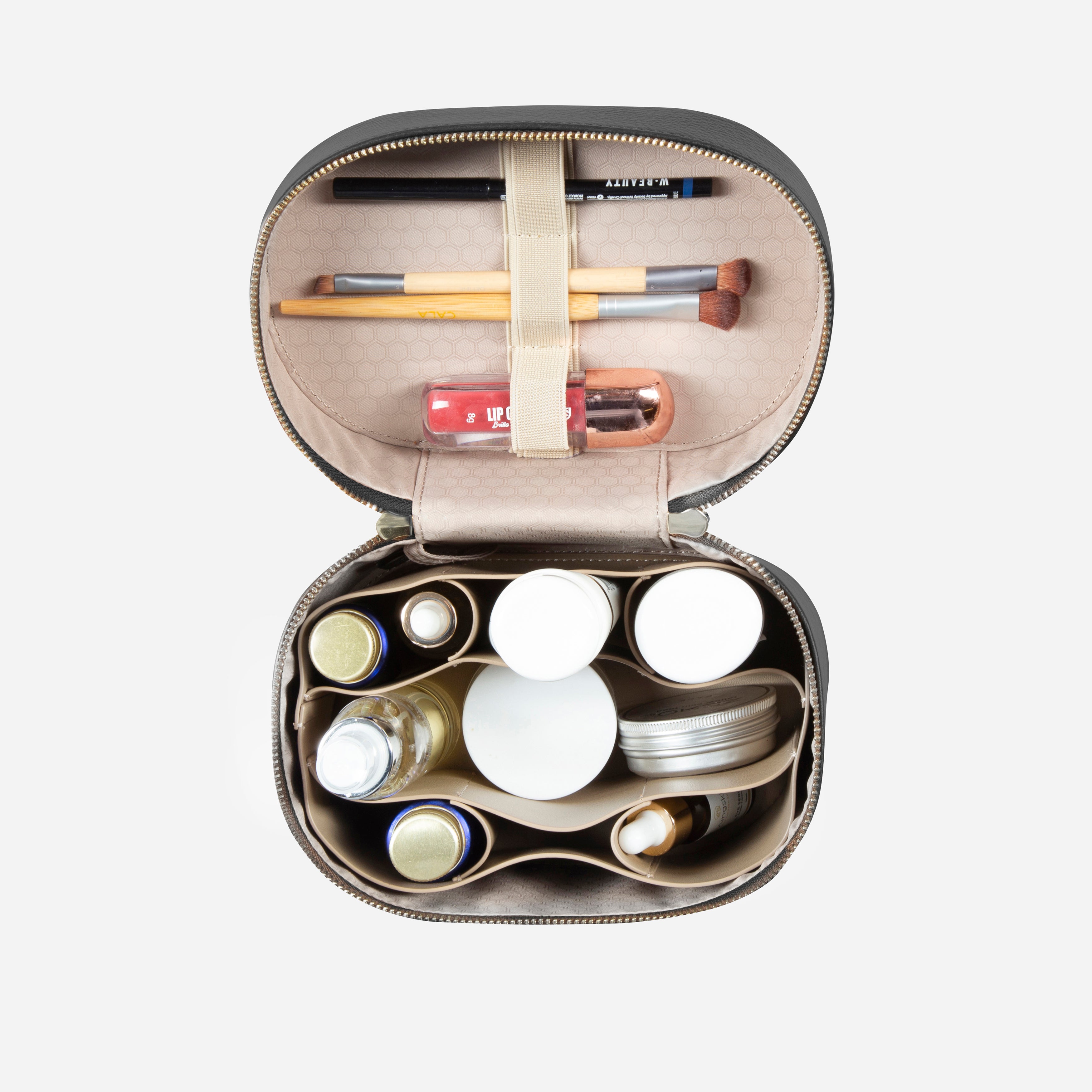 Jekyll & Hide Geneva Vanity Case in Black, packed with cosmetics in the organiser and brushes in the lid strap