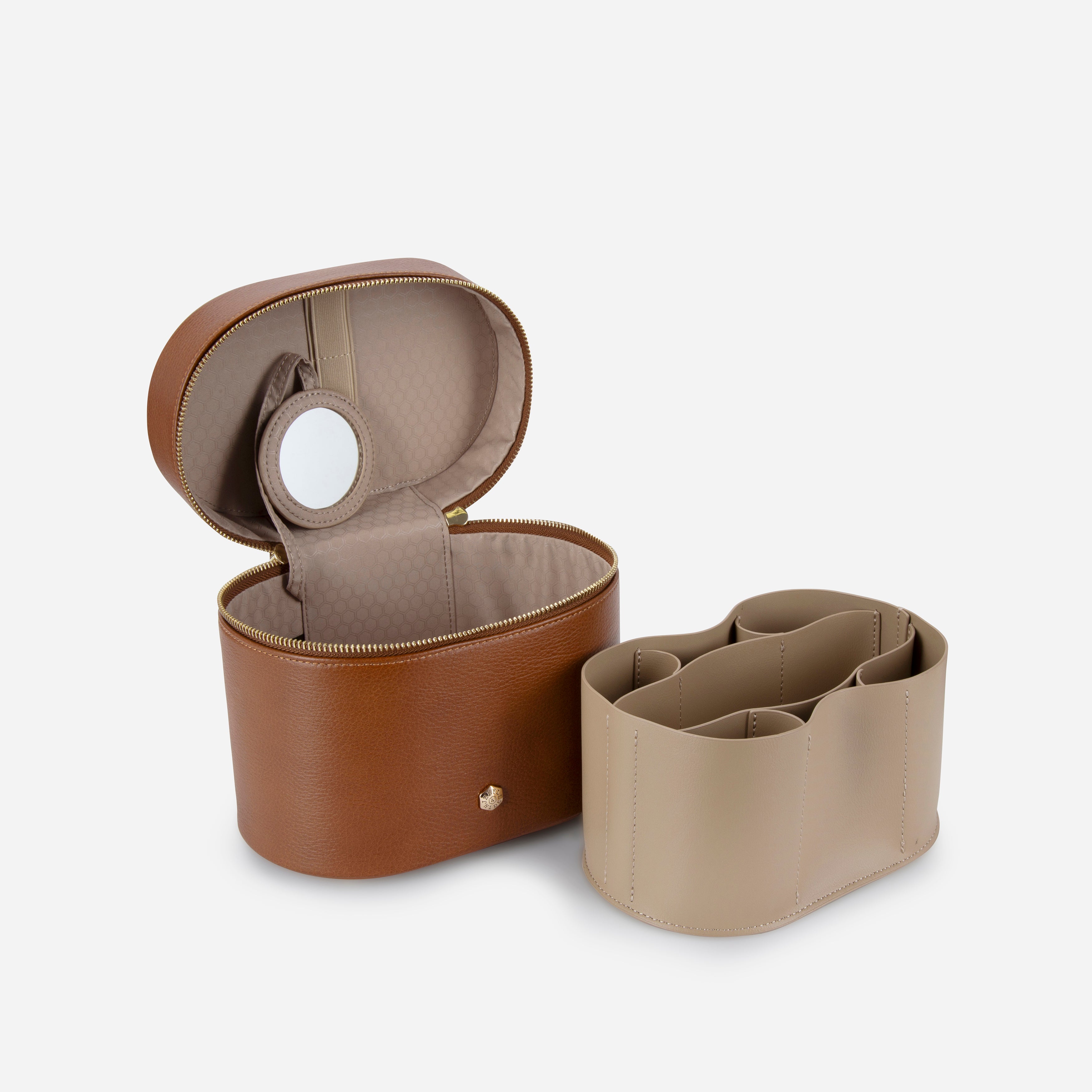 Jekyll & Hide Geneva Vanity Case in Tan, underside showing the four gold-tone metal feet
