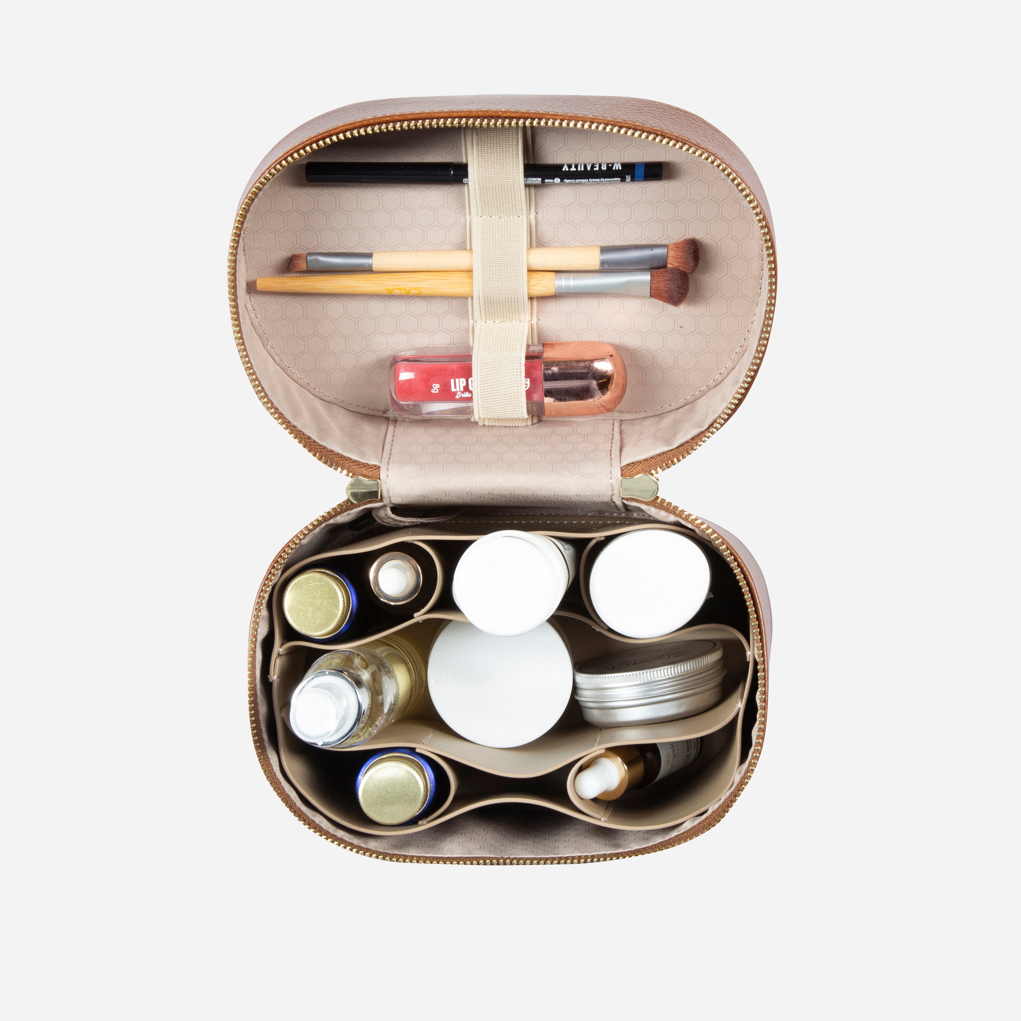 Jekyll & Hide Geneva Vanity Case in Tan, packed with cosmetics in the organiser and brushes in the lid strap