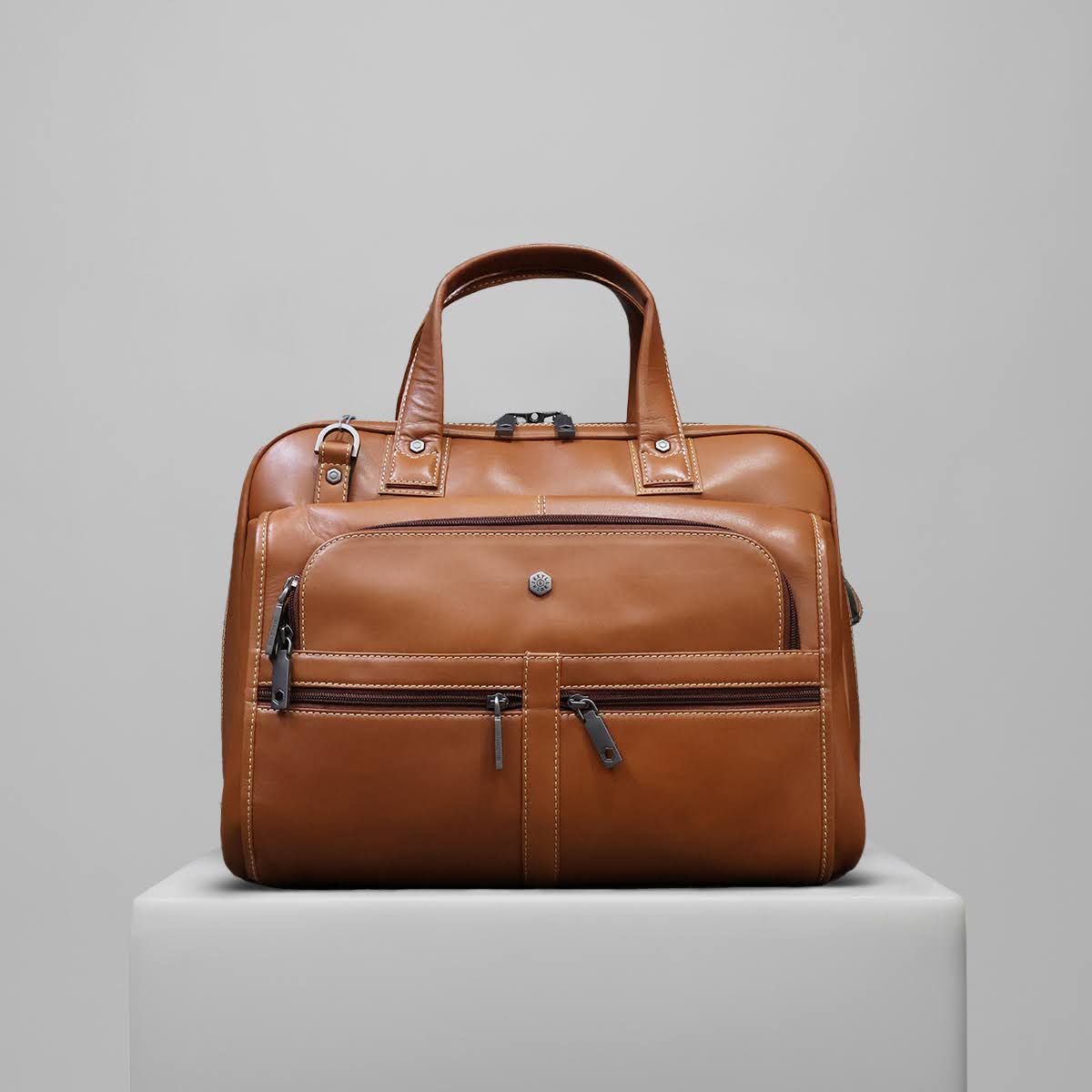 Large Multi Compartment laptop Briefcase in tan colour- Jekyll and Hide SA, lifestyle image